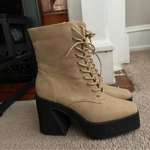 Light tan and black chunky boots